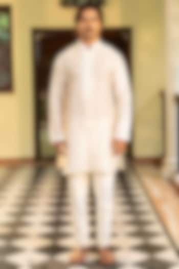 Ivory Chanderi Floral Kasab Embroidered Kurta Set by NAFS