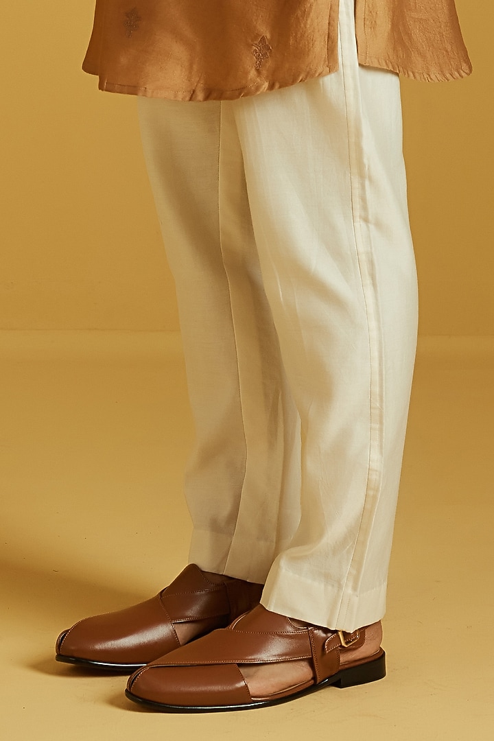 Mustard Chanderi Embroidered Kurta Set by NAFS at Pernia's Pop Up Shop