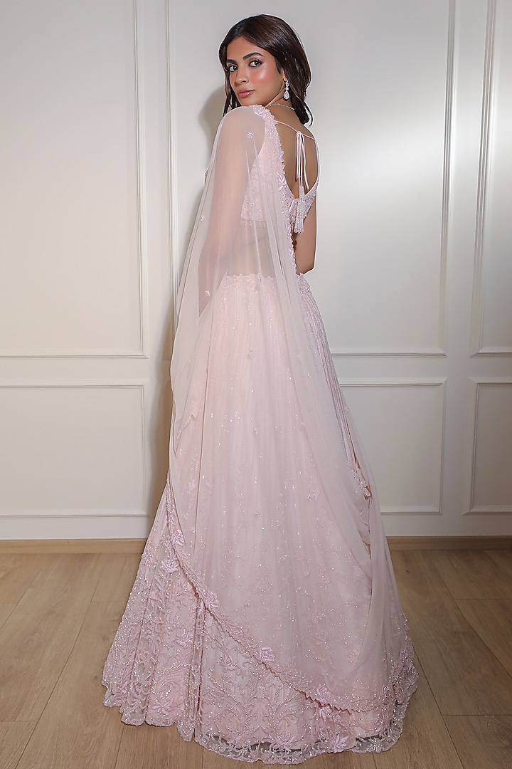 Frosty Pink Net Sequins Embroidered Bridal Lehenga Set by Naibah at Pernia's Pop Up Shop