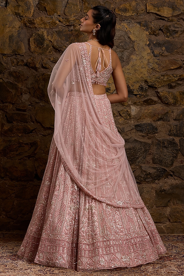 Peach & Silver Net Hand Embroidered Bridal Lehenga Set by Naibah at Pernia's Pop Up Shop