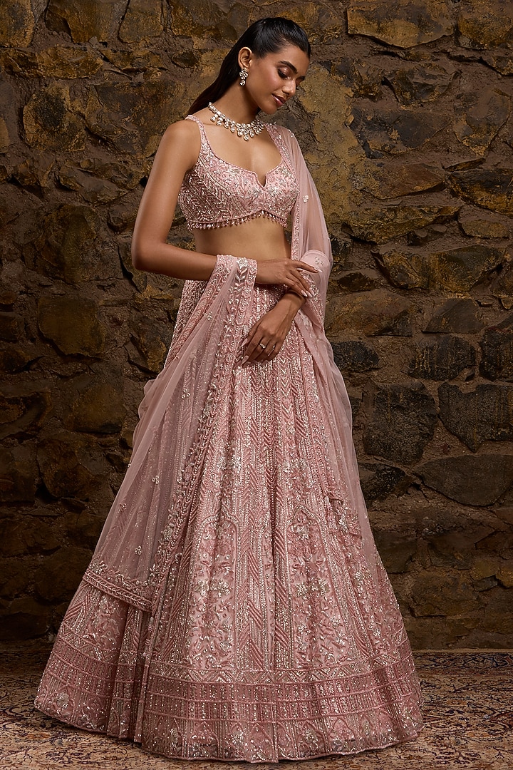 Peach & Silver Net Hand Embroidered Bridal Lehenga Set by Naibah at Pernia's Pop Up Shop