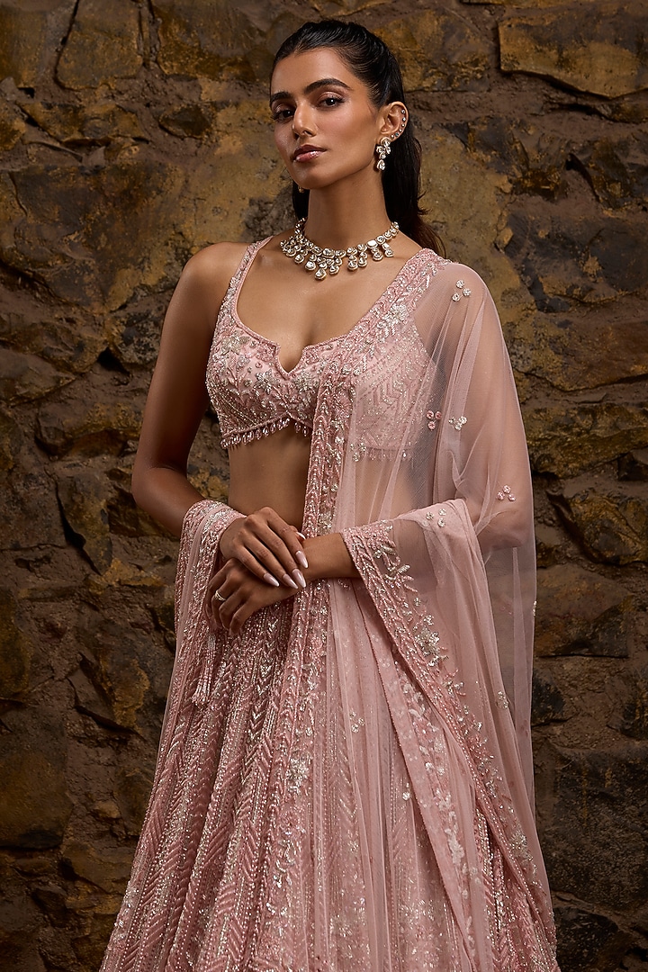 Peach & Silver Net Hand Embroidered Bridal Lehenga Set by Naibah at Pernia's Pop Up Shop