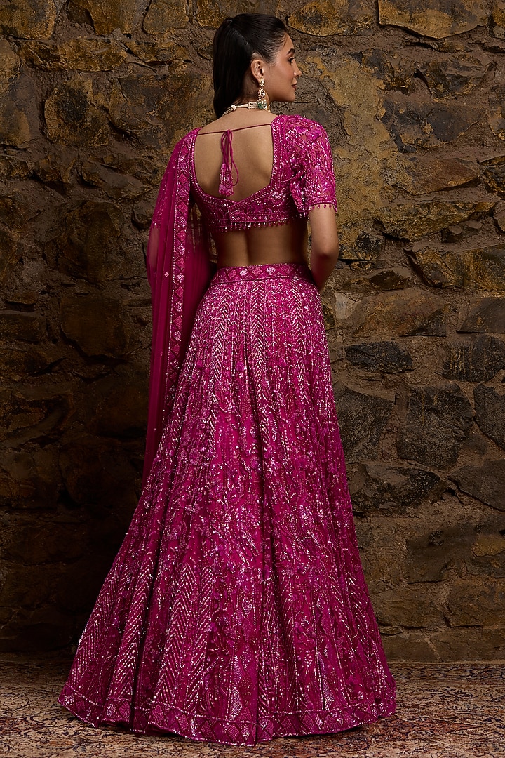 Fuchsia Pink Net Hand Embroidered Bridal Lehenga Set by Naibah at Pernia's Pop Up Shop