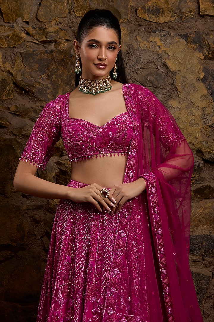 Fuchsia Pink Net Hand Embroidered Bridal Lehenga Set by Naibah at Pernia's Pop Up Shop