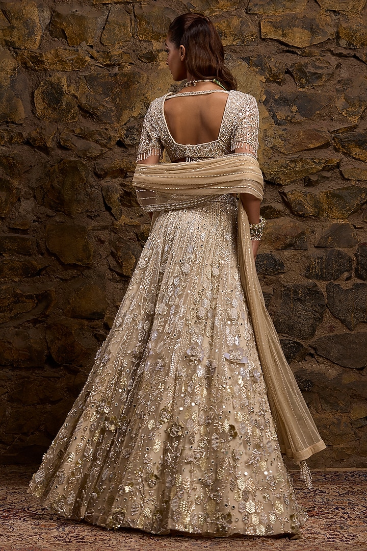 Gold & Silver Ombre Net Hand Embroidered Bridal Lehenga Set by Naibah at Pernia's Pop Up Shop