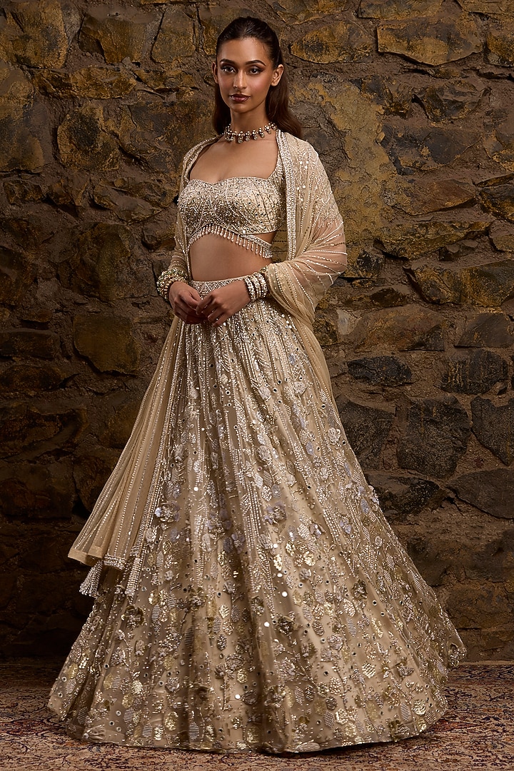 Gold & Silver Ombre Net Hand Embroidered Bridal Lehenga Set by Naibah at Pernia's Pop Up Shop