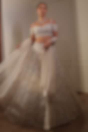 Ivory Organza Sequins Embroidered Bridal Lehenga Set by Naibah at Pernia's Pop Up Shop