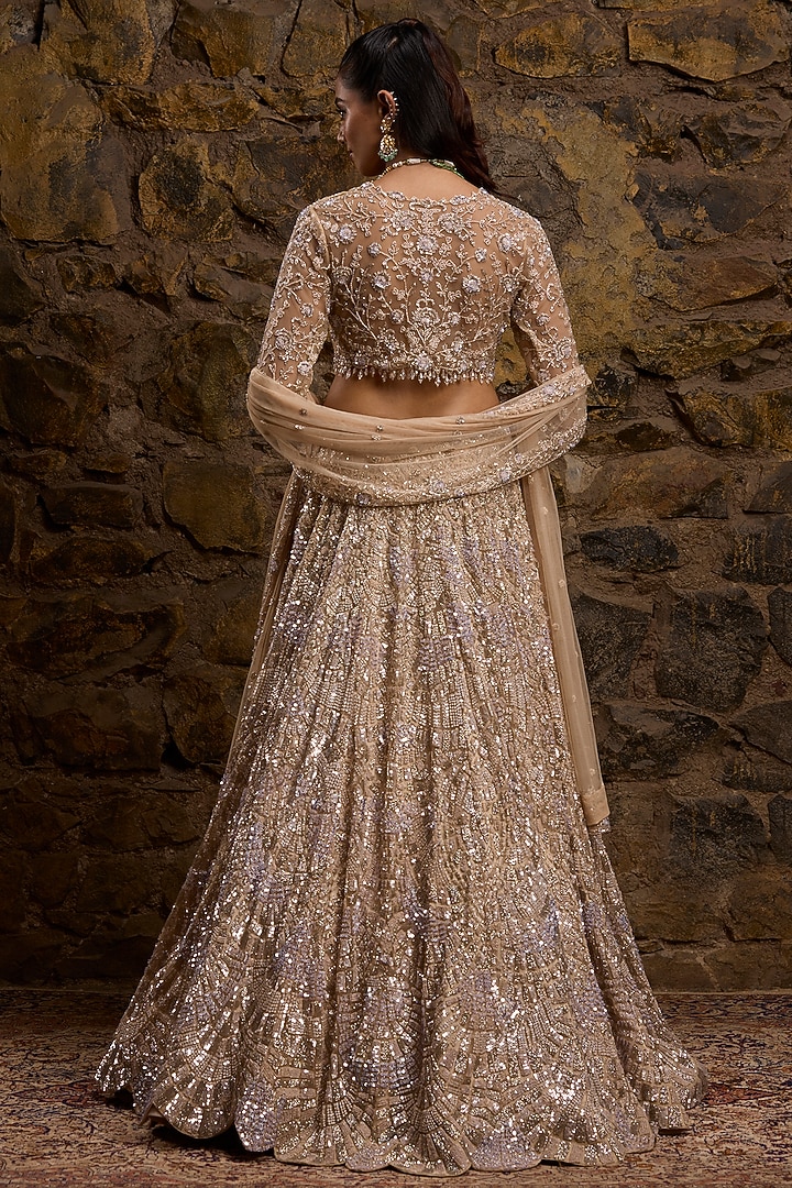 Champagne Gold Net Hand Embroidered Bridal Lehenga Set by Naibah at Pernia's Pop Up Shop