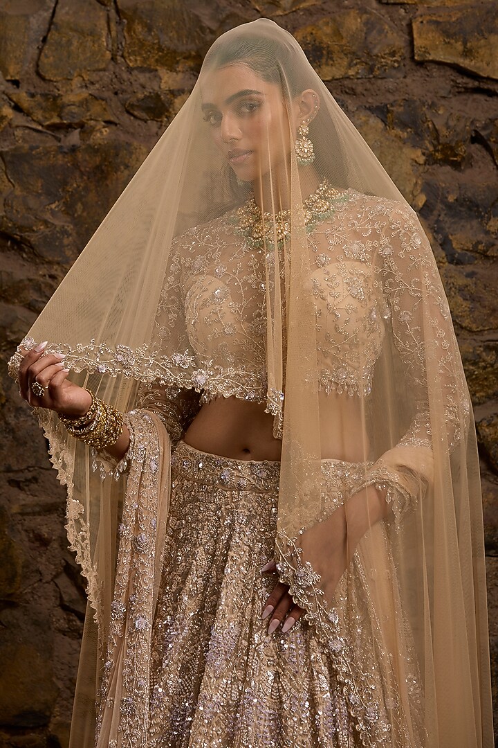 Champagne Gold Net Hand Embroidered Bridal Lehenga Set by Naibah at Pernia's Pop Up Shop
