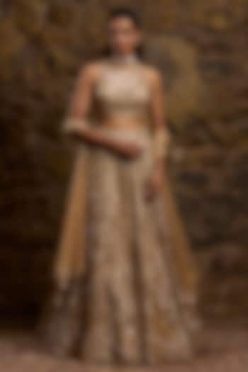 Gold Net Hand Embroidered Bridal Lehenga Set by Naibah at Pernia's Pop Up Shop
