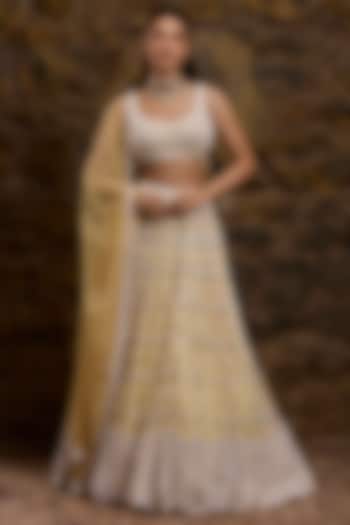 Lemon Yellow Net Hand Embroidered Bridal Lehenga Set by Naibah at Pernia's Pop Up Shop