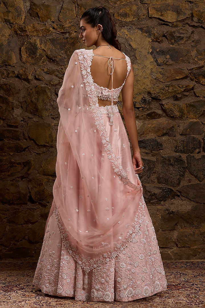 Rose Pink Raw Silk Hand Embroidered Bridal Lehenga Set by Naibah at Pernia's Pop Up Shop