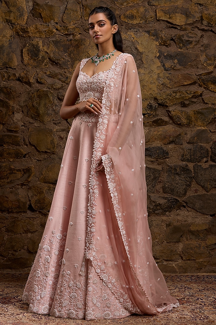 Rose Pink Raw Silk Hand Embroidered Bridal Lehenga Set by Naibah at Pernia's Pop Up Shop