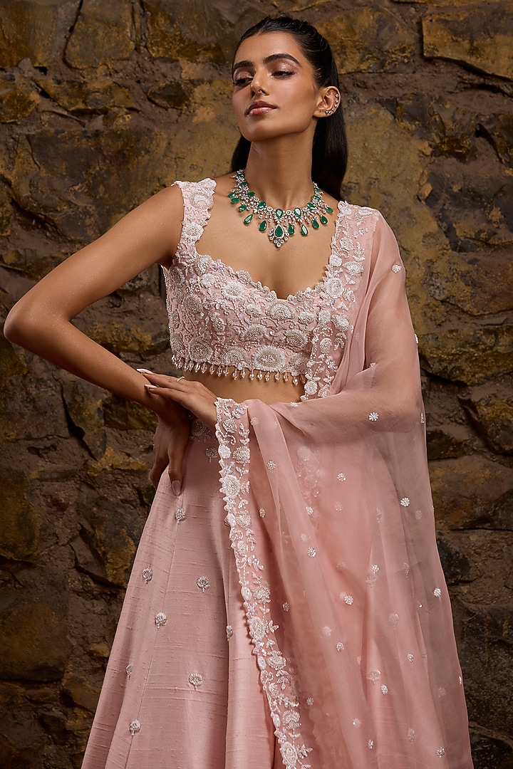 Rose Pink Raw Silk Hand Embroidered Bridal Lehenga Set by Naibah at Pernia's Pop Up Shop