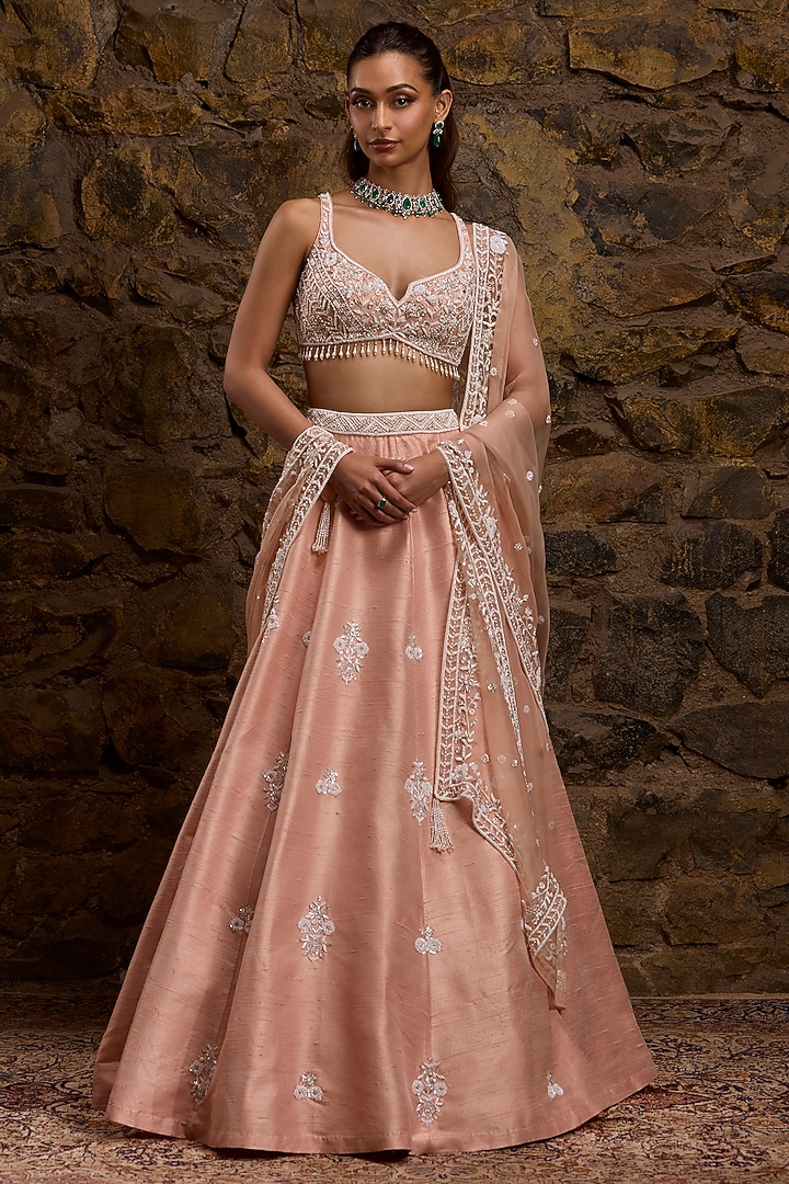 Pink Raw Silk Hand Embroidered Bridal Lehenga Set by Naibah at Pernia's Pop Up Shop