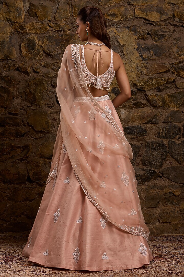 Pink Raw Silk Hand Embroidered Bridal Lehenga Set by Naibah at Pernia's Pop Up Shop