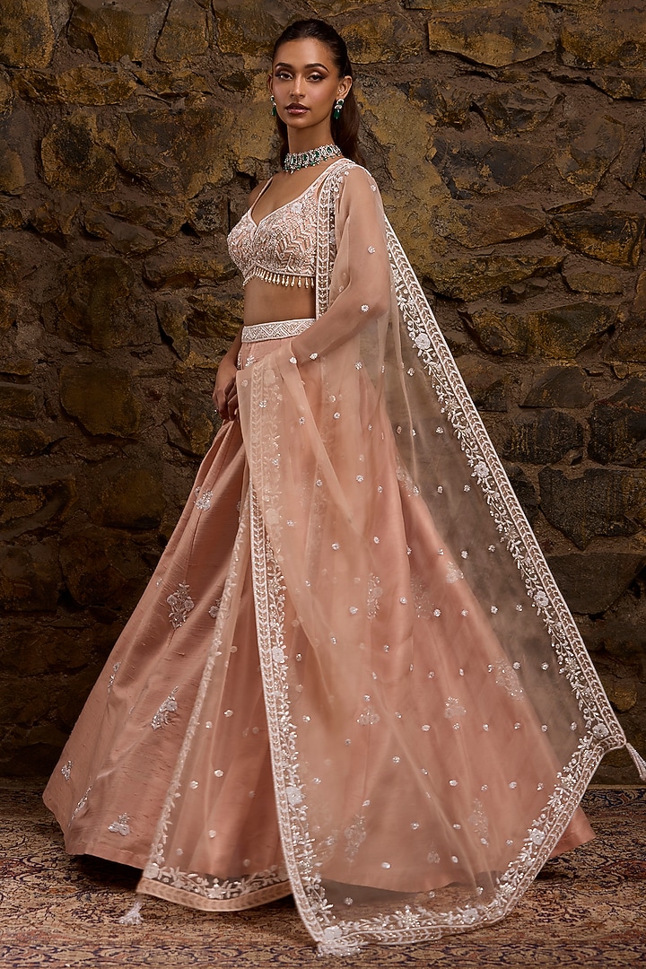 Pink Raw Silk Hand Embroidered Bridal Lehenga Set by Naibah at Pernia's Pop Up Shop