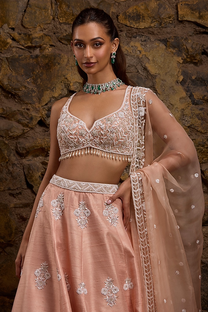 Pink Raw Silk Hand Embroidered Bridal Lehenga Set by Naibah at Pernia's Pop Up Shop