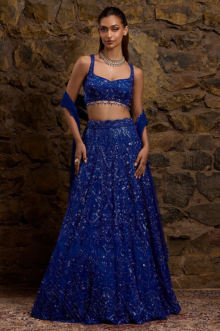 Royal Blue Net Hand Embroidered Bridal Lehenga Set by Naibah at Pernia's Pop Up Shop