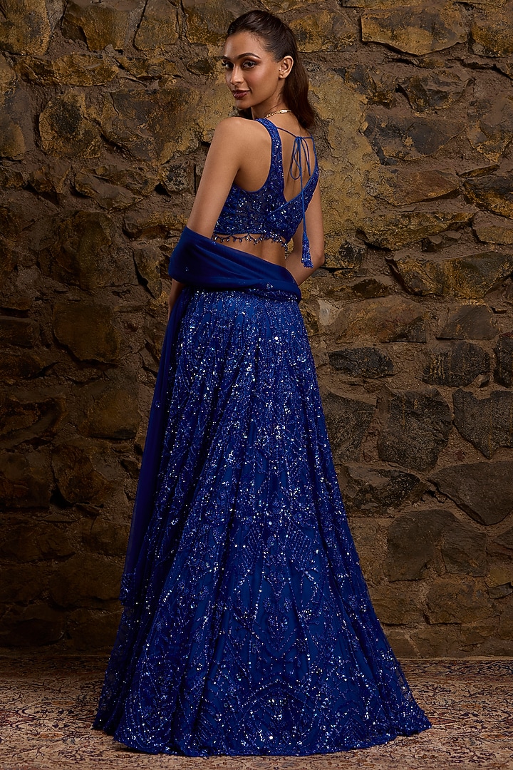 Royal Blue Net Hand Embroidered Bridal Lehenga Set by Naibah at Pernia's Pop Up Shop