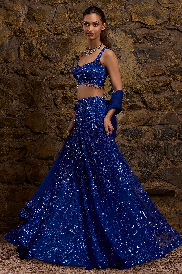 Royal Blue Net Hand Embroidered Bridal Lehenga Set by Naibah at Pernia's Pop Up Shop