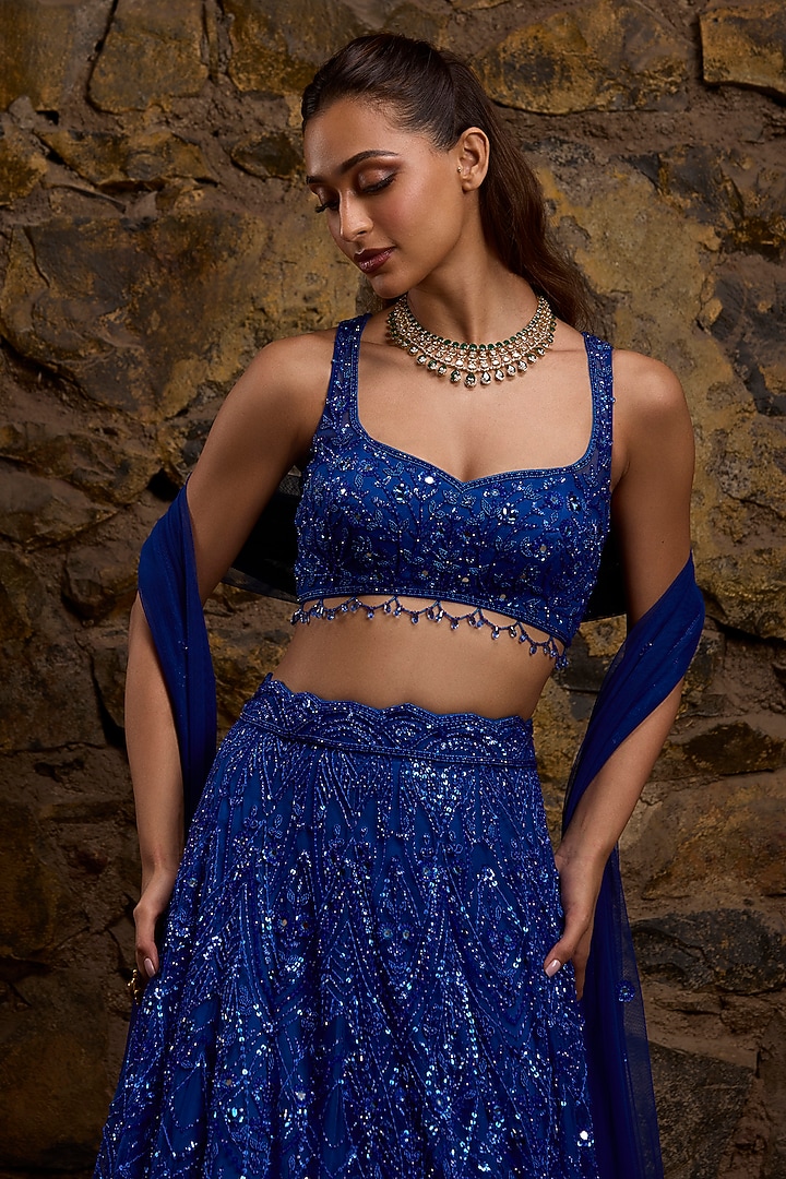 Royal Blue Net Hand Embroidered Bridal Lehenga Set by Naibah at Pernia's Pop Up Shop
