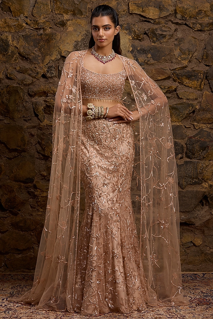 Rose Gold Net Hand Embroidered Fish-Cut Bridal Lehenga Set by Naibah at Pernia's Pop Up Shop