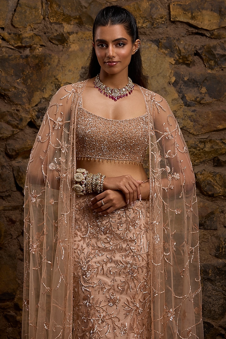 Rose Gold Net Hand Embroidered Fish-Cut Bridal Lehenga Set by Naibah at Pernia's Pop Up Shop