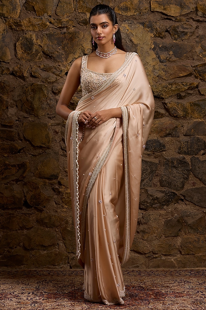 Peach Satin & Net Hand Embroidered Bridal Saree Set by Naibah at Pernia's Pop Up Shop