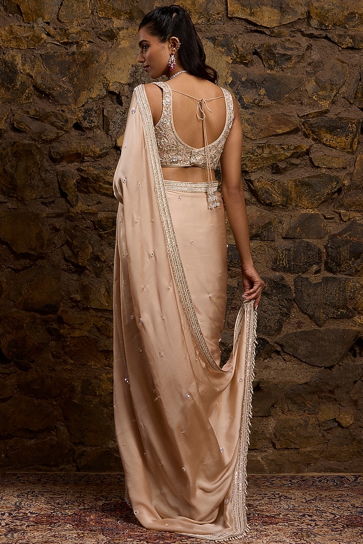 Peach Satin & Net Hand Embroidered Bridal Saree Set by Naibah at Pernia's Pop Up Shop