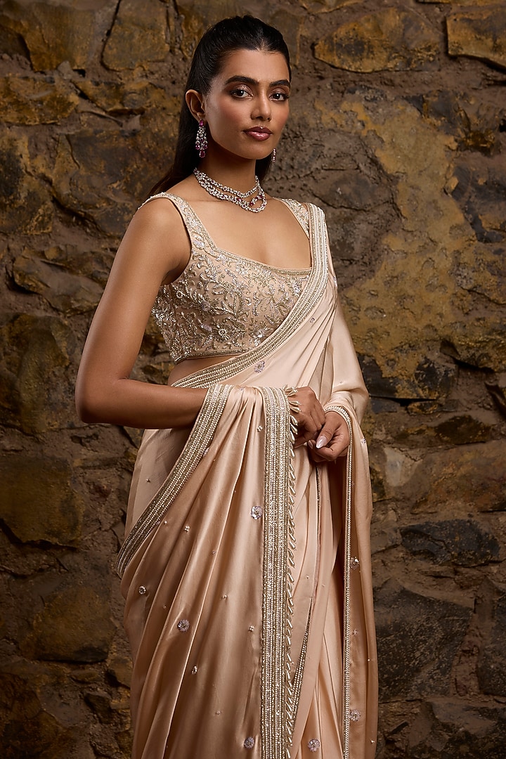 Peach Satin & Net Hand Embroidered Bridal Saree Set by Naibah at Pernia's Pop Up Shop