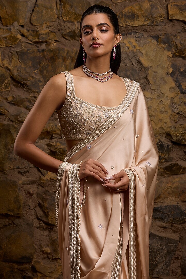 Peach Satin & Net Hand Embroidered Bridal Saree Set by Naibah at Pernia's Pop Up Shop