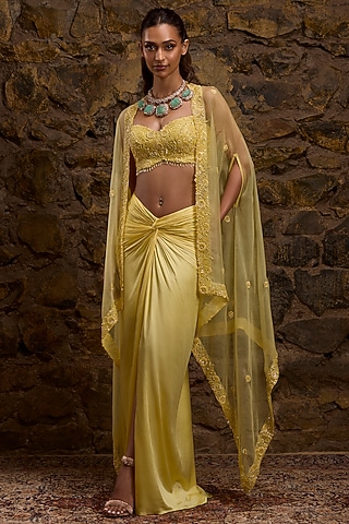 Yellow Satin & Net Hand Embroidered Skirt Set by Naibah