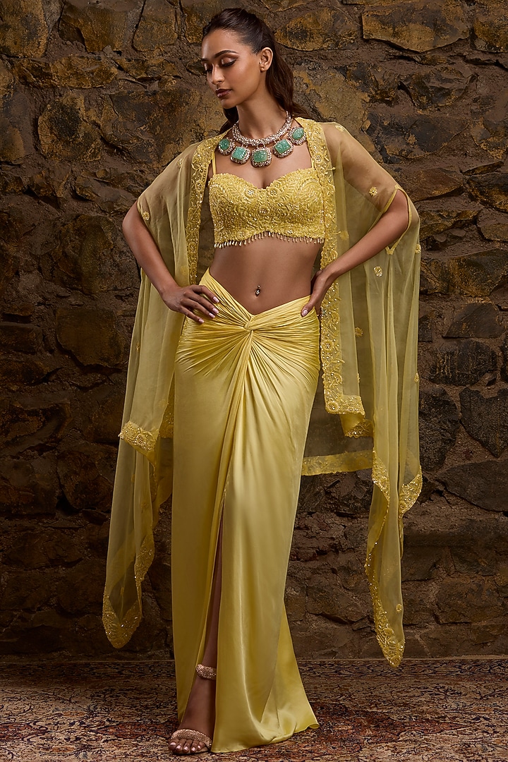 Yellow Satin & Net Hand Embroidered Skirt Set by Naibah at Pernia's Pop Up Shop