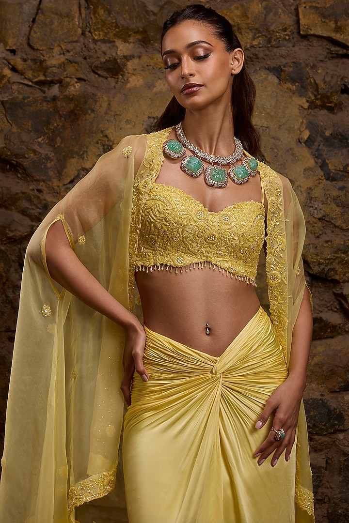 Yellow Satin & Net Hand Embroidered Skirt Set by Naibah at Pernia's Pop Up Shop
