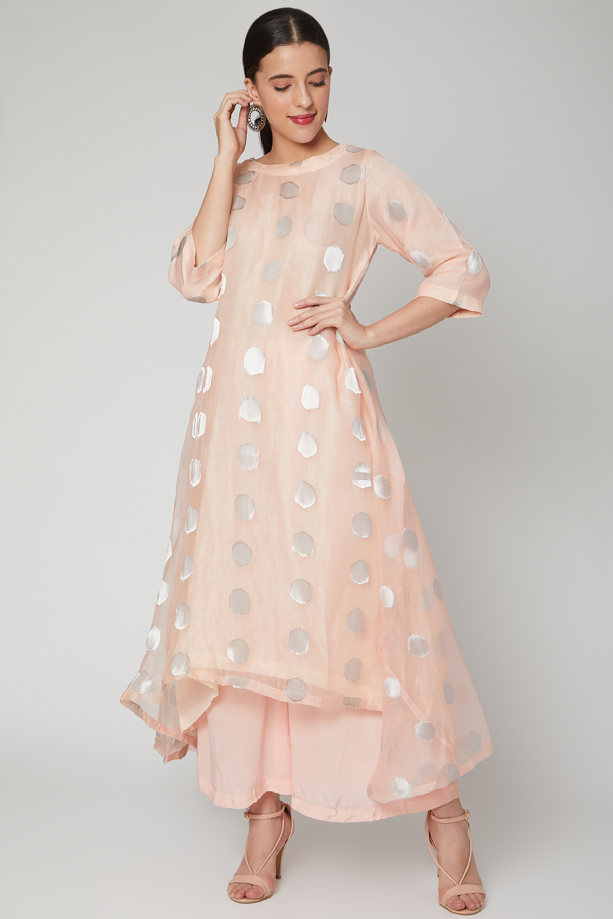 Peach & Silver Asymmetric Kurta Set by NAINA ARUNIMA at Pernia's Pop Up Shop