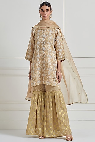 Dull Gold Brocade Zardosi Embroidered Sharara Set by Naina Arunima