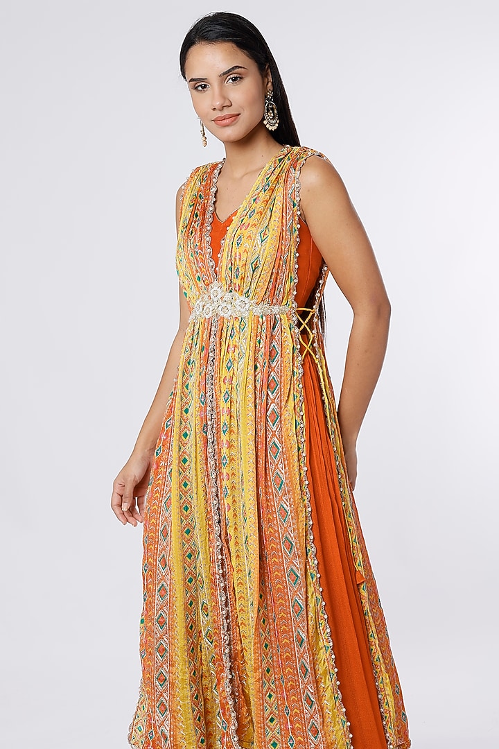 Rust Dupion Silk & Crepe Chiffon Embroidered Cape Set by NIsha Ajmera at Pernia's Pop Up Shop