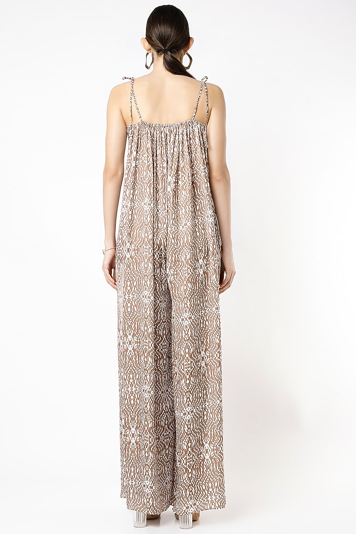 Nude & White Printed Off-Shoulder Jumpsuit by NA-KA at Pernia's Pop Up Shop
