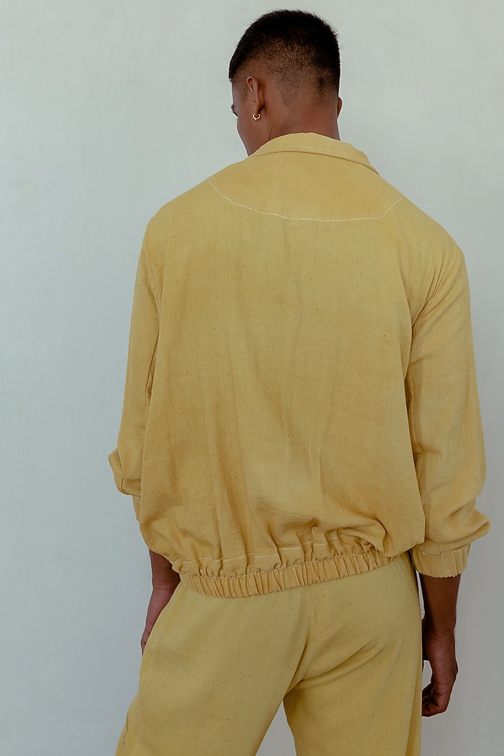 Marigold Yellow Hand-Dyed Bomber Jacket by Naushad Ali Men at Pernia's Pop Up Shop