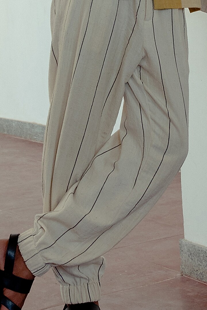 Kora & Black Hand-Dyed Joggers by Naushad Ali Men at Pernia's Pop Up Shop
