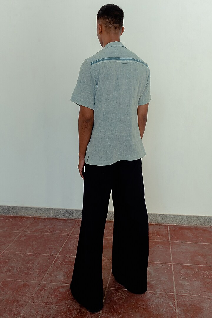 Black Wide-Legged Trousers by Naushad Ali Men at Pernia's Pop Up Shop