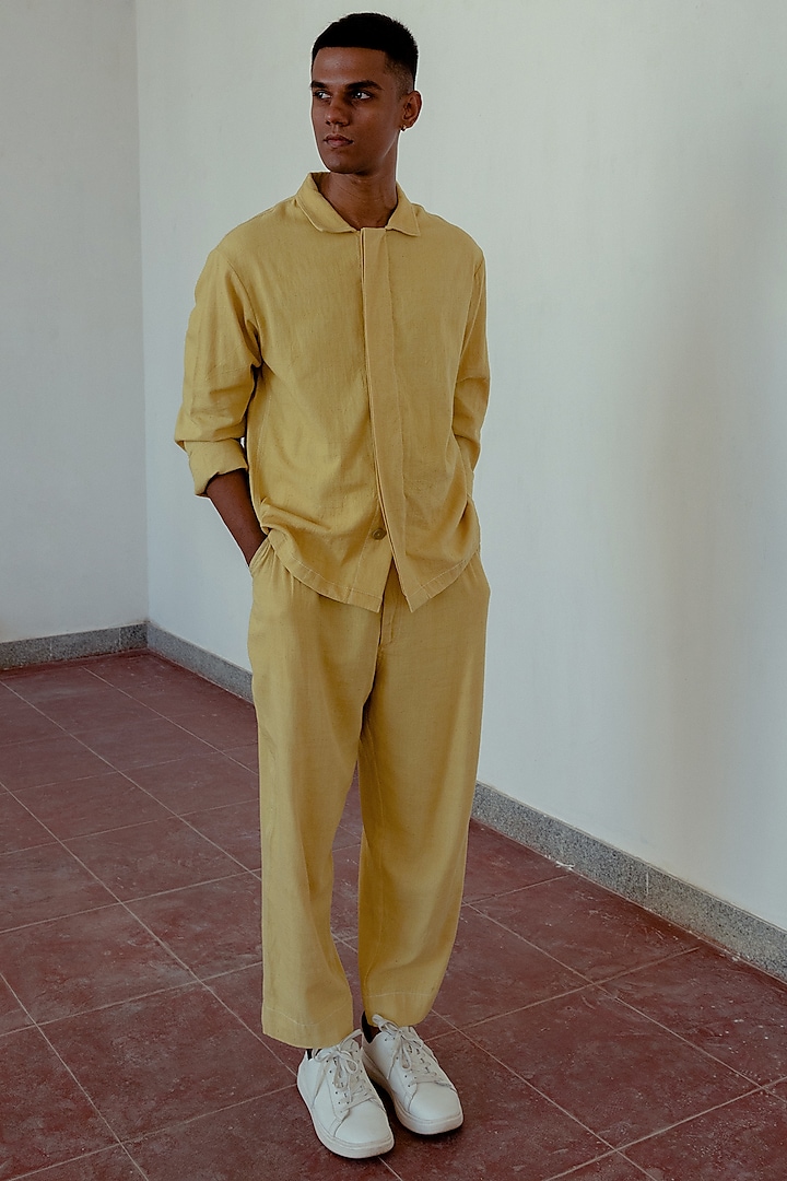 Marigold Yellow Hand-Dyed Pleated Trousers by Naushad Ali Men