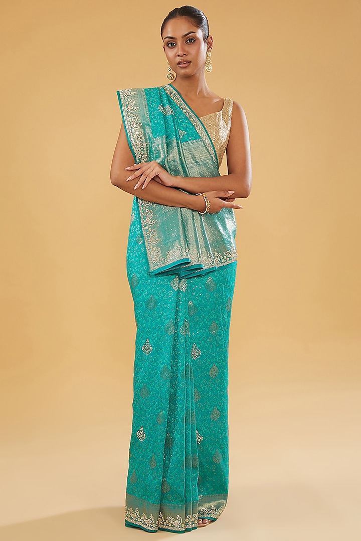 Blue Silk Blend Jacquard Crystal Embellished Woven Saree Set by NARMADESHWARI