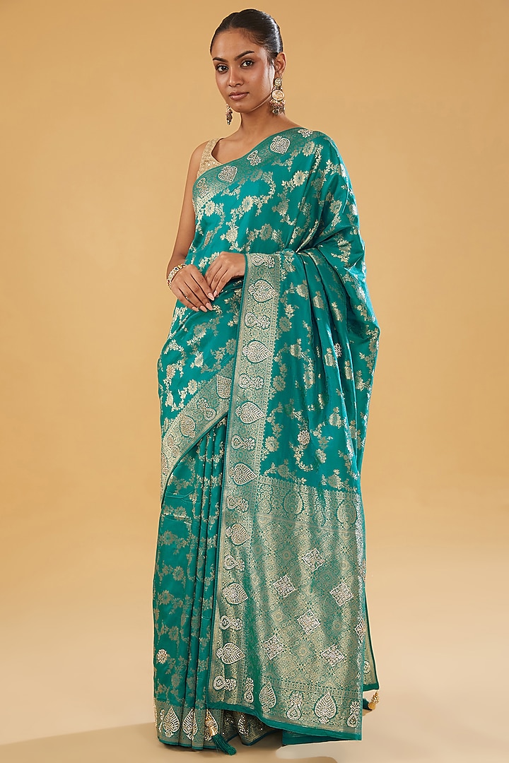 Blue Silk Blend Brocade Crystal Embellished Woven Saree Set by NARMADESHWARI