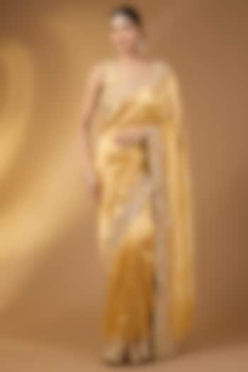 Yellow Tissue Silk Pearl Embellished Party Wear Saree Set by NARMADESHWARI at Pernia's Pop Up Shop