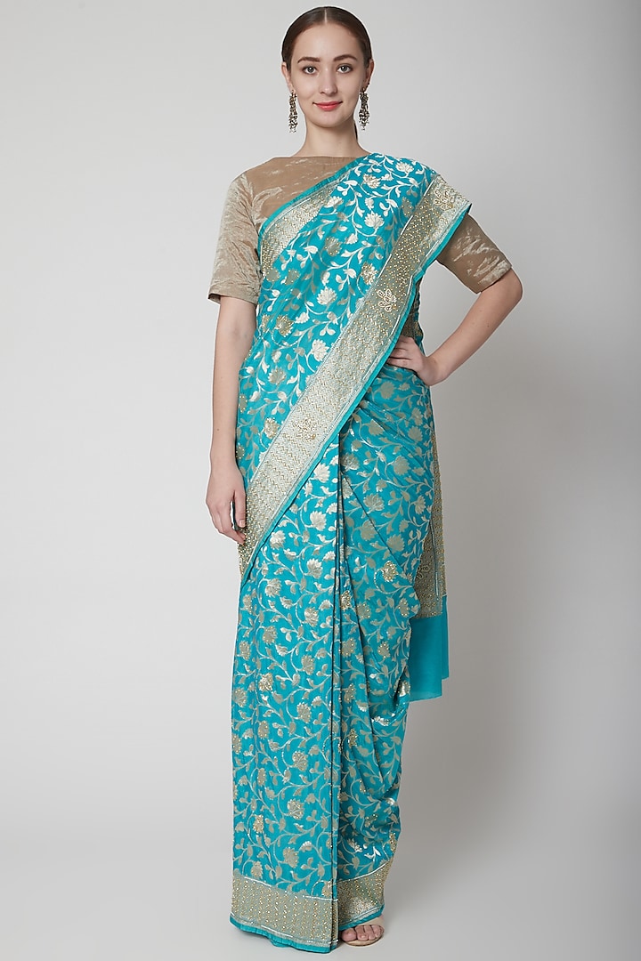 Turquoise Saree With Hand Embroidery by NARMADESHWARI