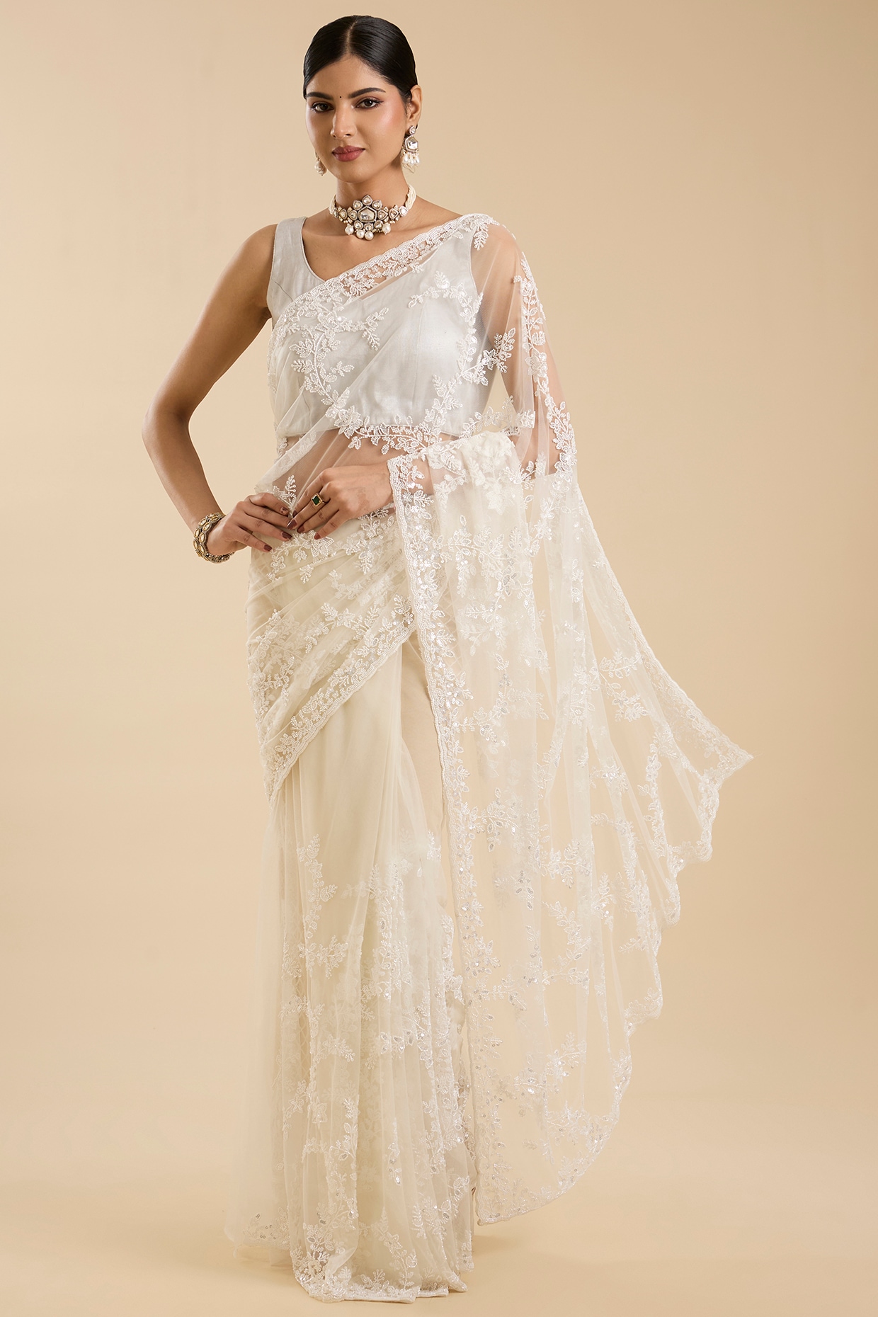 NARMADESHWARI Cream Net Cutdana & Sequin Embellished Saree Set