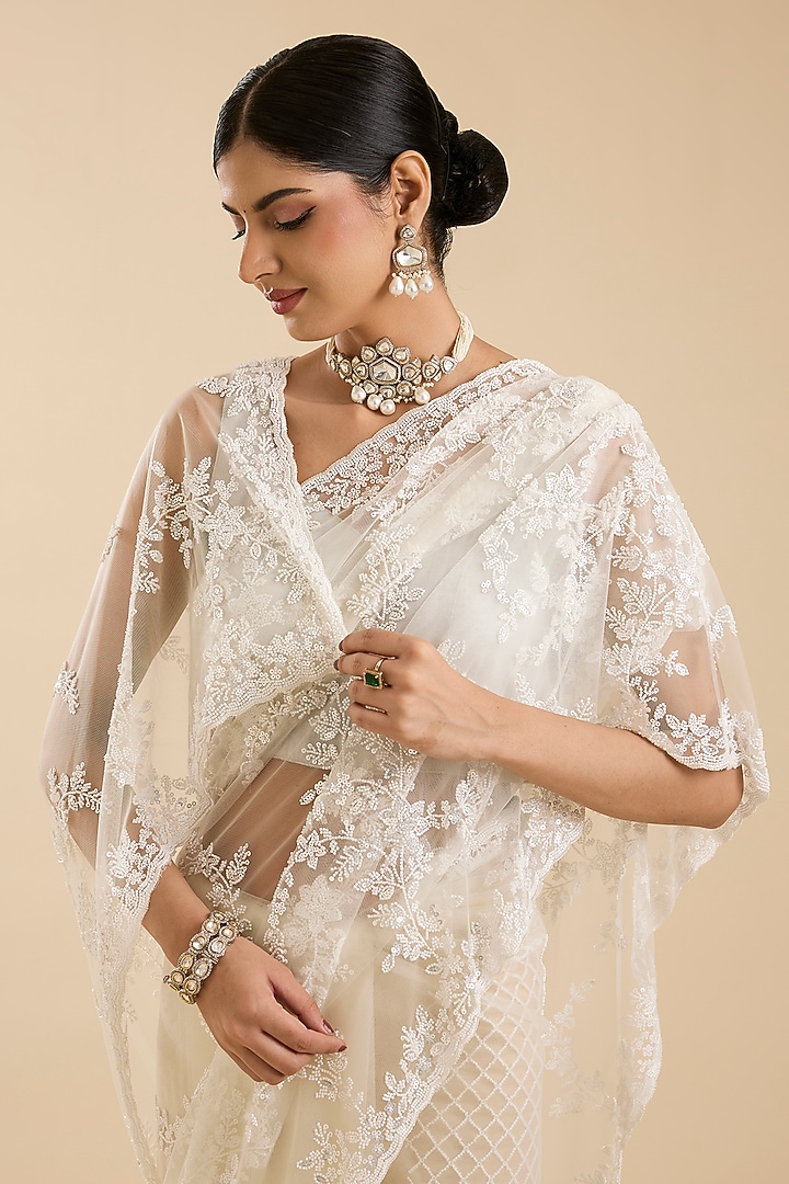 Cream Net Cutdana & Sequin Embellished Party Wear Saree Set by NARMADESHWARI at Pernia's Pop Up Shop