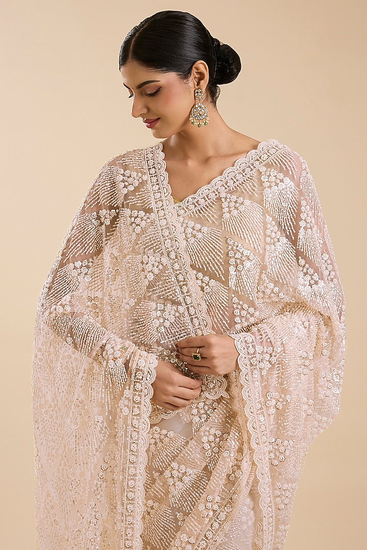 Beige Net Cutdana & Sequin Embellished Party Wear Saree Set by NARMADESHWARI at Pernia's Pop Up Shop